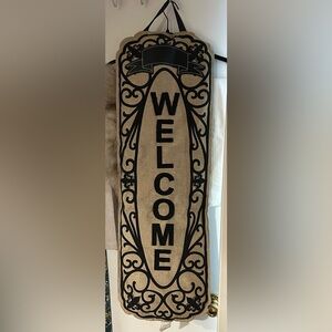 Black and Tan Welcome Sign